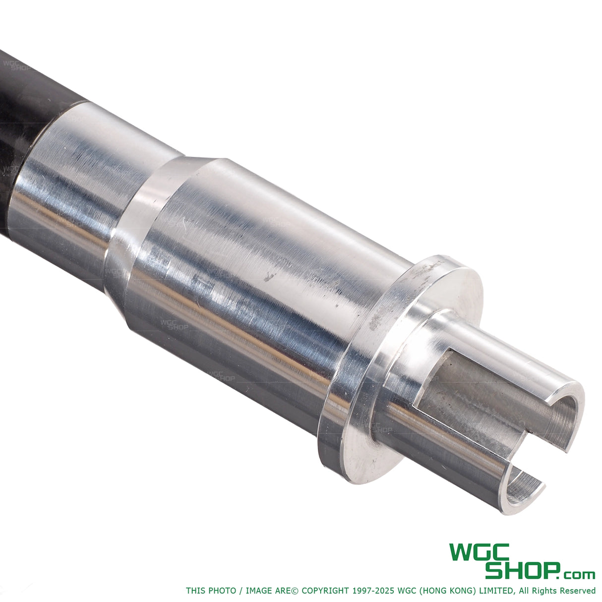 close-up of shiny silver metal barrel assembly part with polished finish for airsoft gun