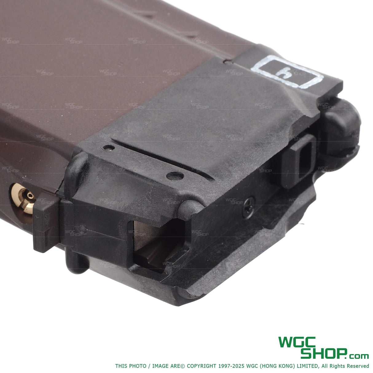 Close-up of VFC AVS74U AKS74U gas airsoft magazine with black and brown parts