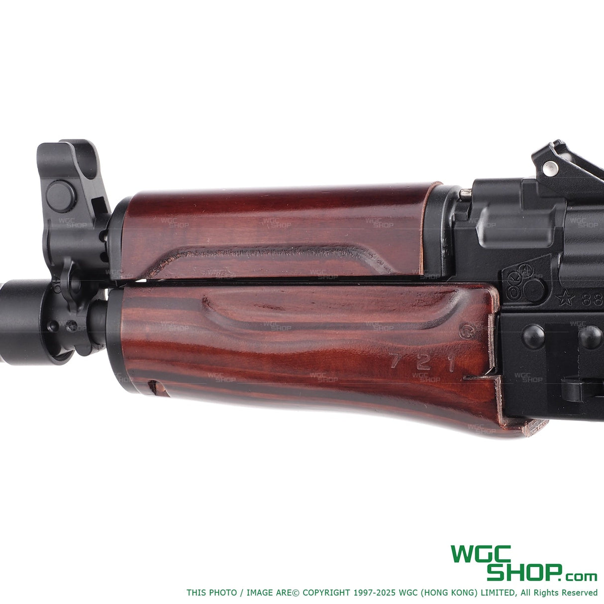 Close-up of VFC AKS74U airsoft rifle handguard and front sight with wood finish