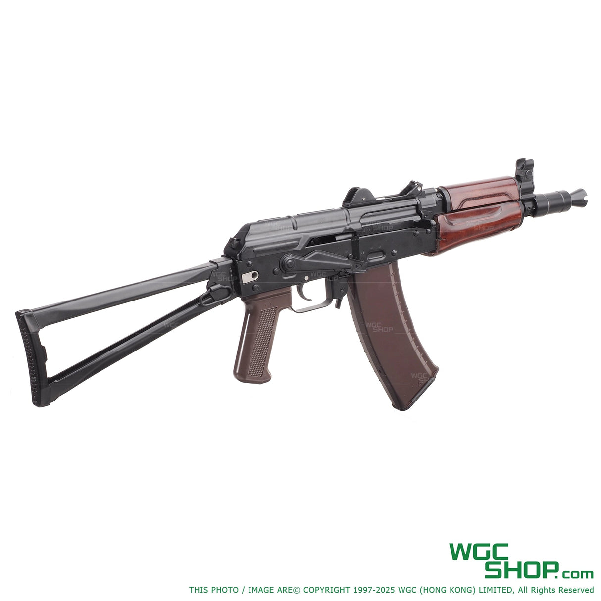 VFC AKS-74U airsoft rifle with folding stock and brown magazine on white background