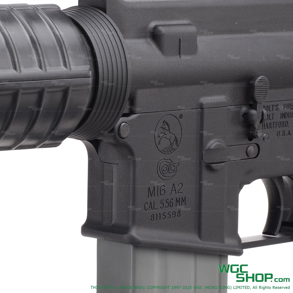 Close-up of Colt M16 A2 5.56mm rifle receiver with black handguard and magazine