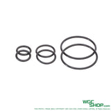 Set of six black rubber O-rings in three different sizes on white background