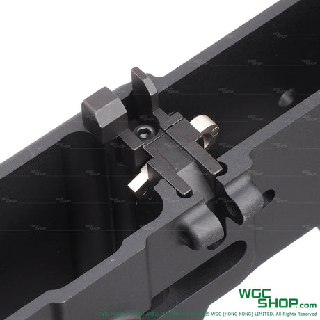 Close-up of DNA receiver kit for T91 GBB airsoft gun, showing black metal components inside receiver frame