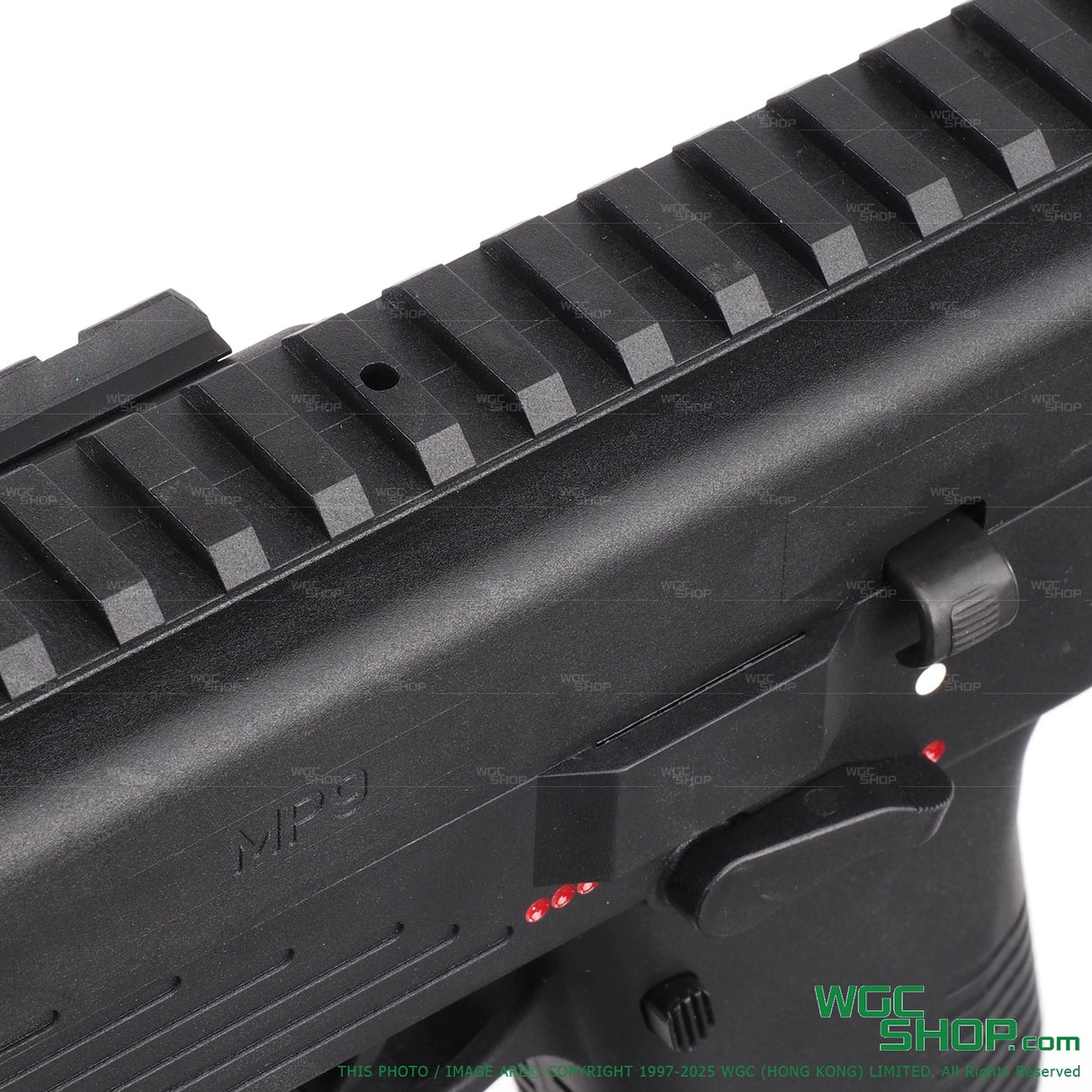 Close-up view of Maruyama MP IX MP9's rail & hop-up adjust hole