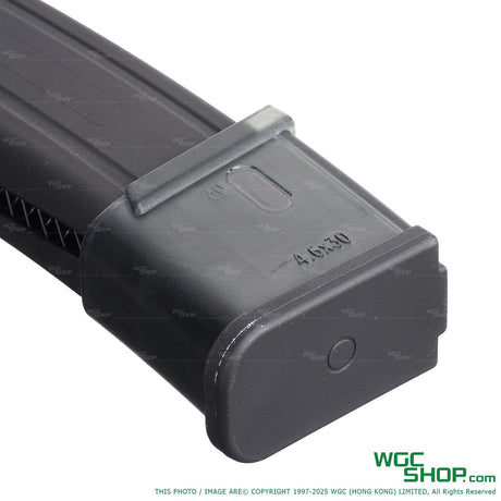 Close-up of black Reload MP7 30-round CO2 airsoft magazine with 4.6x30 marking