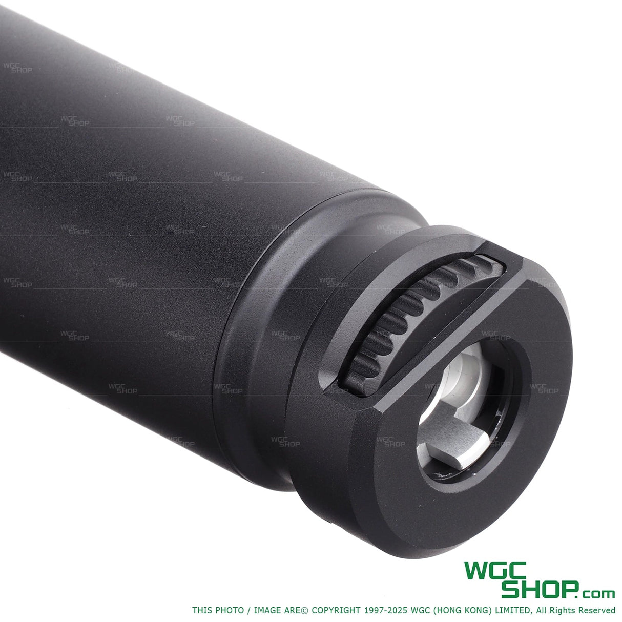 Close-up of a black Task Forces SQD SMG suppressor with detailed mounting end