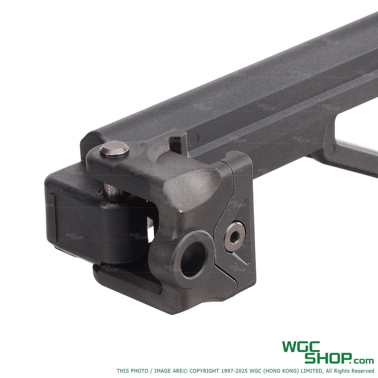 Close-up of black Tokyo Marui folding 20mm rail stock hinge mechanism on white background