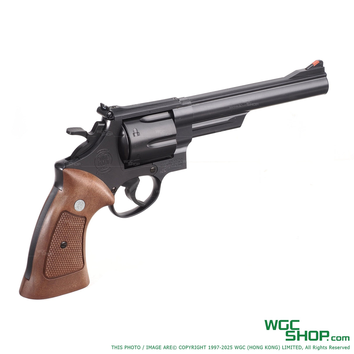 Tokyo Marui M29 .44 Magnum 6.5-inch air revolver with black barrel and wooden grip, isolated on white