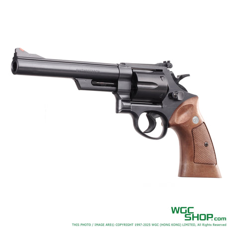 Tokyo Marui M29 4.5-inch air revolver with black barrel and brown grip on white background