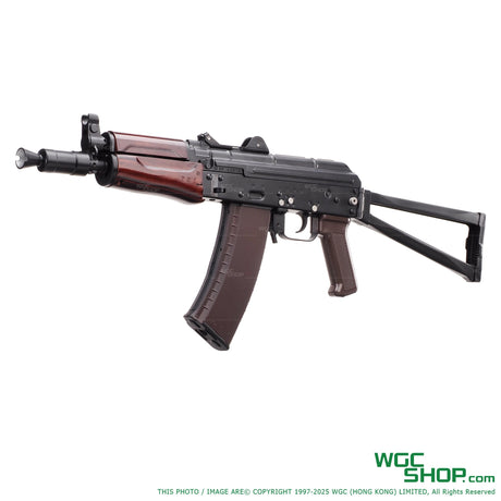 AKS-74U style airsoft rifle with black metal body, brown magazine and wooden handguard
