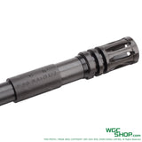 Close-up of black 5.56 NATO 1/7 rifle barrel with flash hider on white background