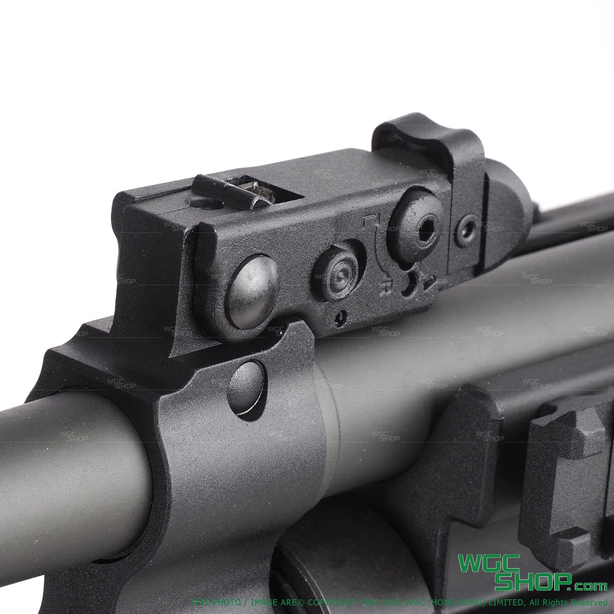 Close-up of VFC Umarex MG4 electric airsoft gun barrel and adjustable rear sight in black and grey