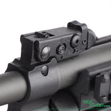 Close-up of VFC Umarex MG4 electric airsoft gun barrel and adjustable rear sight in black and grey